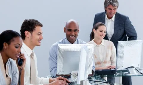 Assertive business team working in the office Stock Photos