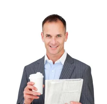 Assertive businessman reading a newspaper Stock Photos