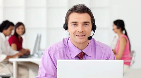 Assertive businessman using headset Stock Photos