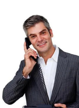 Assertive businessman using a mobile phone Stock Photos