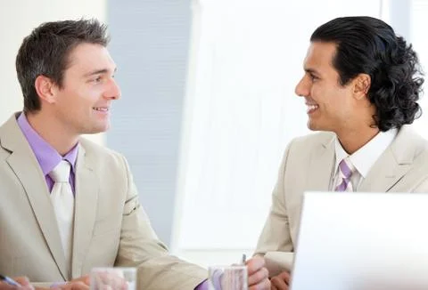 Assertive businessmen interacting Stock Photos