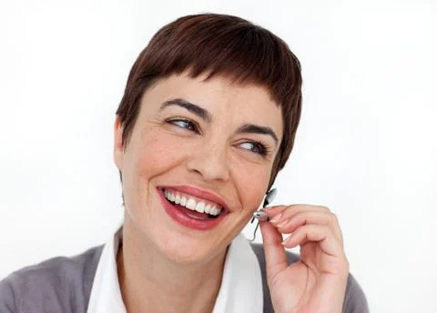 Assertive customer service representative using headset Stock Photos