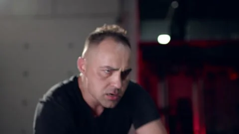 Assertive man doing exercises with battle rope, ruthlessly effective workout. Stock Footage 155661249