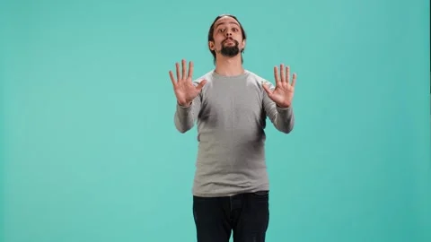 Assertive man doing stop hand gesture sign 스톡 동영상 319469861