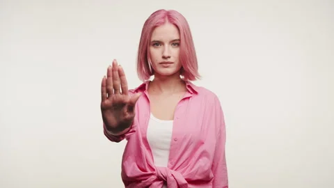 Assertive Woman with Stop Gesture 스톡 동영상 260811289