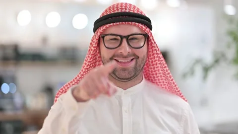 Assertive Young Arabic Man with Pointing at the Camera Stock Footage 139771998