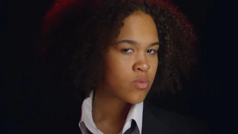 Assertive Young Black Woman Looking at Camera Stock Footage 104813953