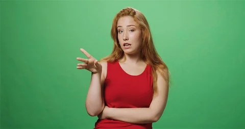 Assertive young woman, greenscreen, slow motion Stock Footage 114130488