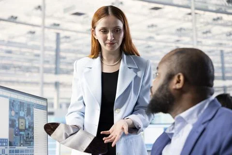 Assessing production quality, semiconductor substrates and woman with man Stock Photos