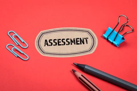 ASSESSMENT. Business concept. Red notes and documents folder. Office supplie Stock Photos