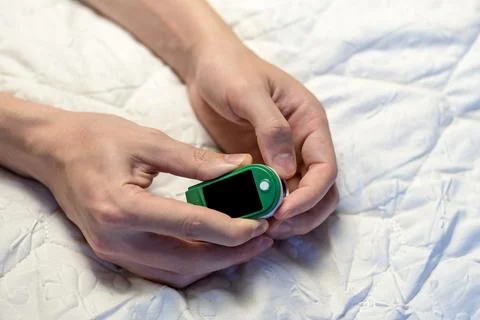 Assessment of the respiratory system function. a device for measuring blood s Stock Photos