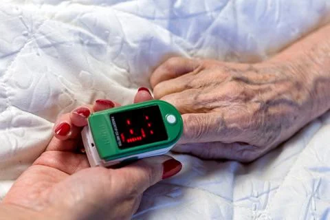 Assessment of the respiratory system function. measurement of blood saturatio Stock Photos