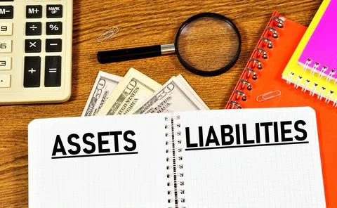 Assets liabilities. Text label in the working document. Stock Photos