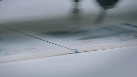 Assigning a unique number to a document. Production of documents. Stock Footage 254590007
