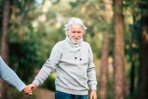 Assistance and disease alzheimer problems for old people- senior man holding  Stock Photos