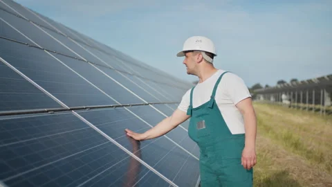Assistance technical worker in uniform is checking an operation and efficiency Stock Footage 158819454