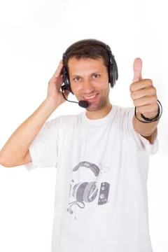 Assistant with headset showing ok with thumb up Stock Photos