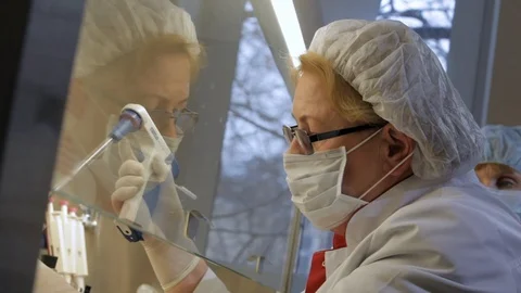 Assistant of lab preparing a preparate Video stock 100599551