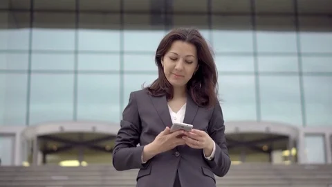 Assistant manager talking on the mobile phone Stock Footage 76165878