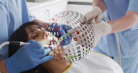 Assistant placing suction while dentist sweeping wand forming rotating code orb Stock Footage 318012134