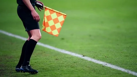 Assistant referee moving along the sideline during a soccer match 動画素材 73908252