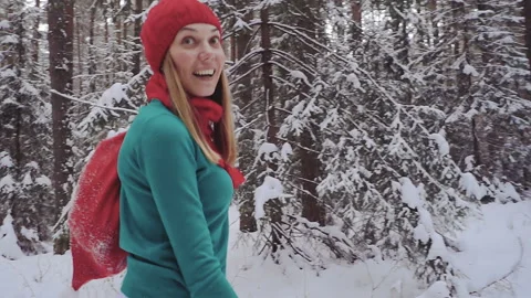 Assistant Santa Claus walks through the forest with a bag of gifts Stock Footage 86208736