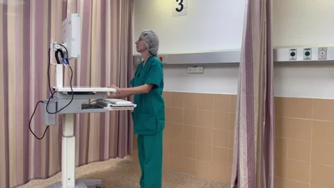 Assistant Typing Medical Expertise On Computer Stock Footage 254410390
