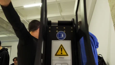 Assistants adjust joints on camera jib with precision Stock Footage 308953049