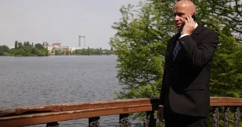 Associate Businessman Mobile Talking About Meeting Outside Office Business Deal Vidéo 75723819