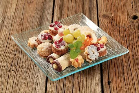 Assorted appetizers on a glass serving tray Stock Photos