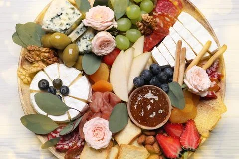 Assorted appetizers on white wooden table, top view Stock Photos