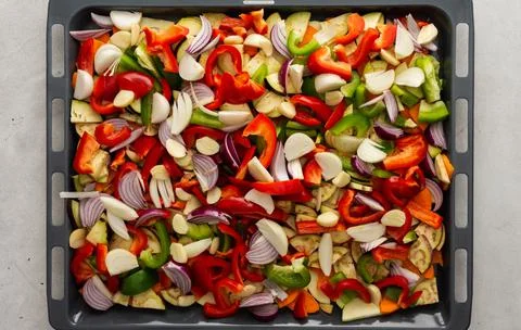 Assorted autumn cut vegetables on a baking sheet Foto stock