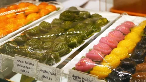 Assorted baba nyonya food angku kuih arranged on tray selling at the restaurant. Видео 199595448