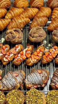 Assorted bakery delights on the shelf Stock Photos