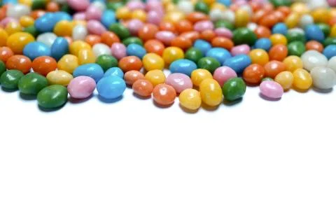 Assorted bean candies on white background Stock Photos