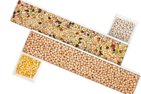 Assorted beans in different rectangular boxes Stock Photos