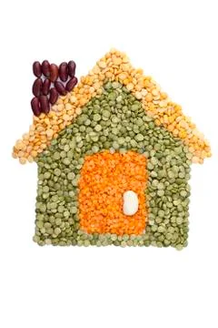 Assorted beans forming a house Stock Photos