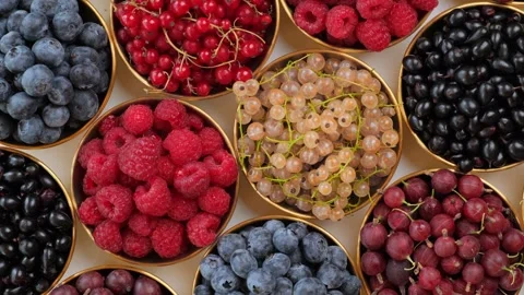 Assorted Berries In Bowls On White Background 스톡 동영상 345087025