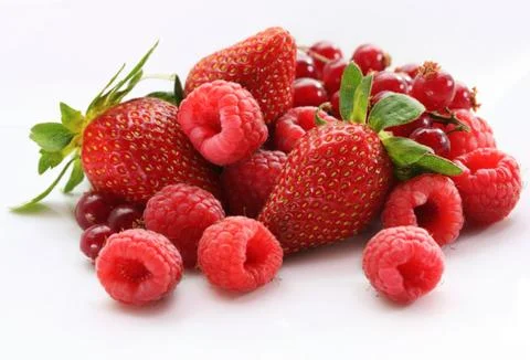 Assorted berries isolated in white Stock Photos