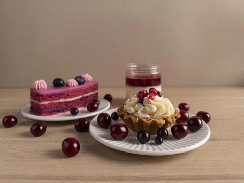 Assorted Berry Desserts on Plates 스톡 사진
