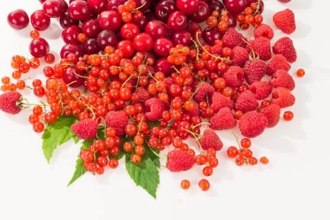 Assorted berry on a white background. Cherries, raspberries, red currants. 写真素材