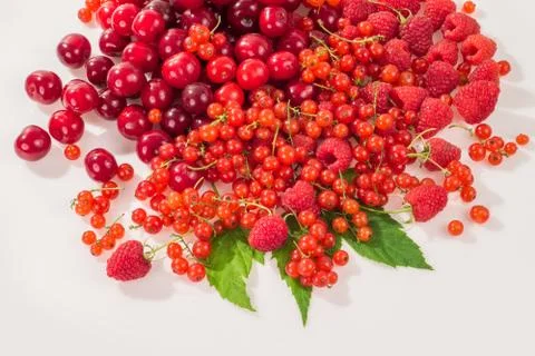 Assorted berry on a white background. Cherries, raspberries, red currants. Foto stock