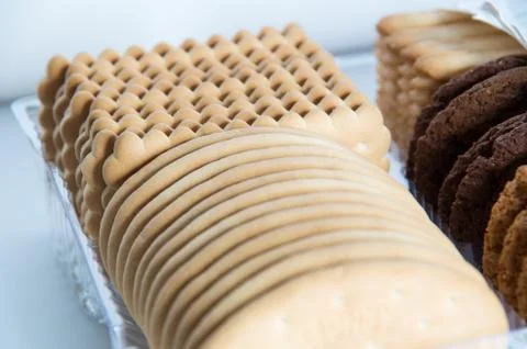 Assorted biscuits in a packaging tray Stock Photos
