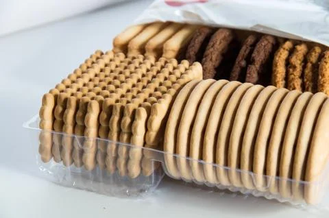 Assorted biscuits in a packaging tray Stock Photos
