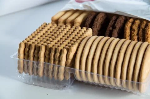 Assorted biscuits in a packaging tray Stock Photos