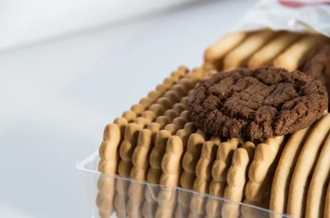 Assorted biscuits in a packaging tray Stock Photos
