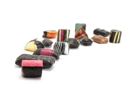 Assorted black rock candy Stock Photos