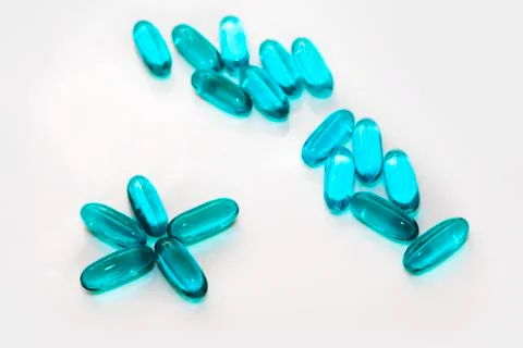 Assorted blue capsules Stock Photos