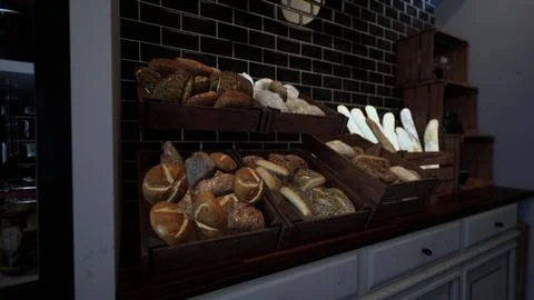 Assorted Bread Display in a Filled Display Case 스톡 일러스트