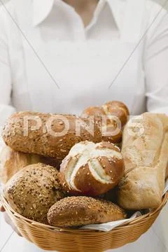 Assorted bread rolls in a basket Stock Photos